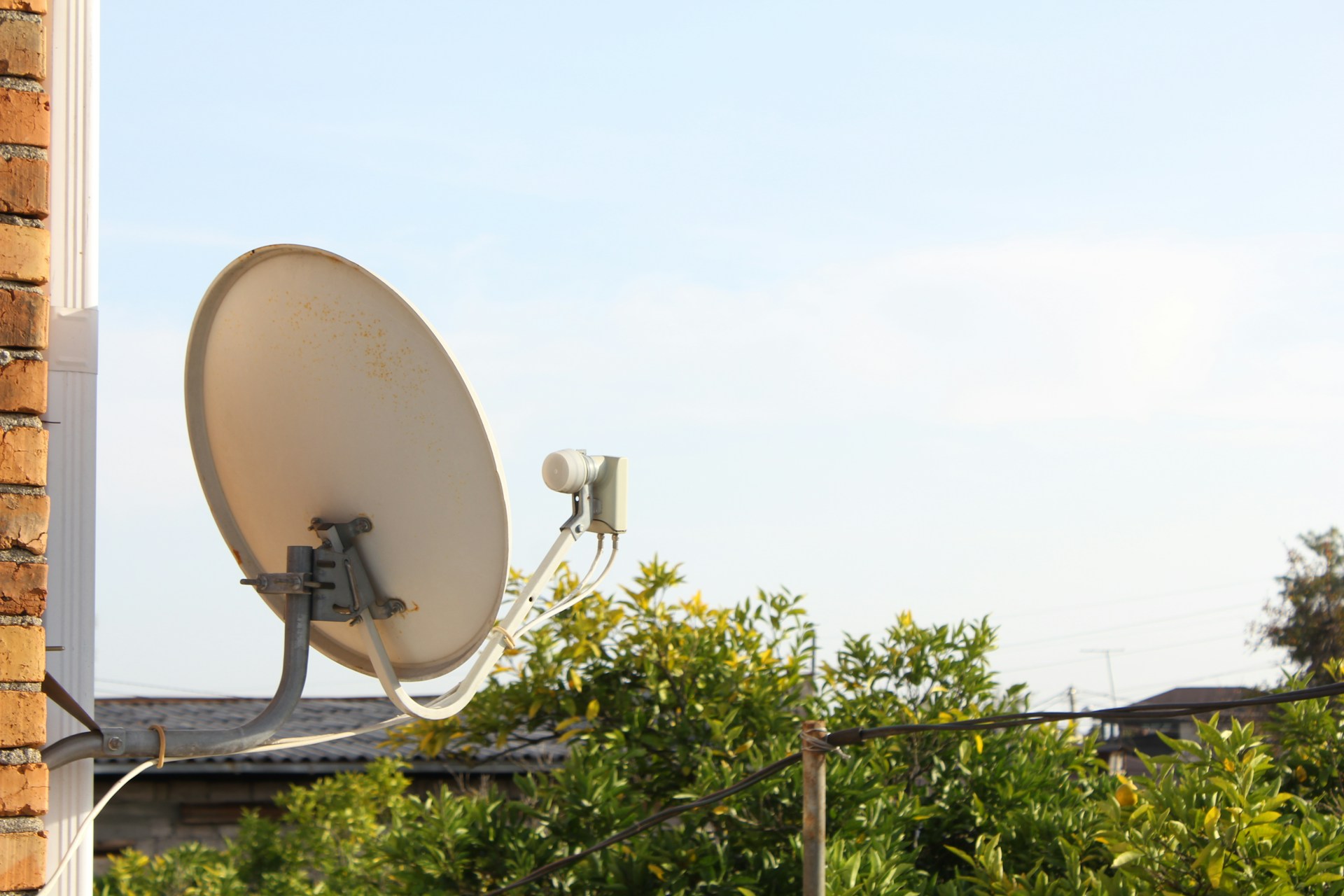 Professional satellite dish alignment for improved reception and clearer TV signal