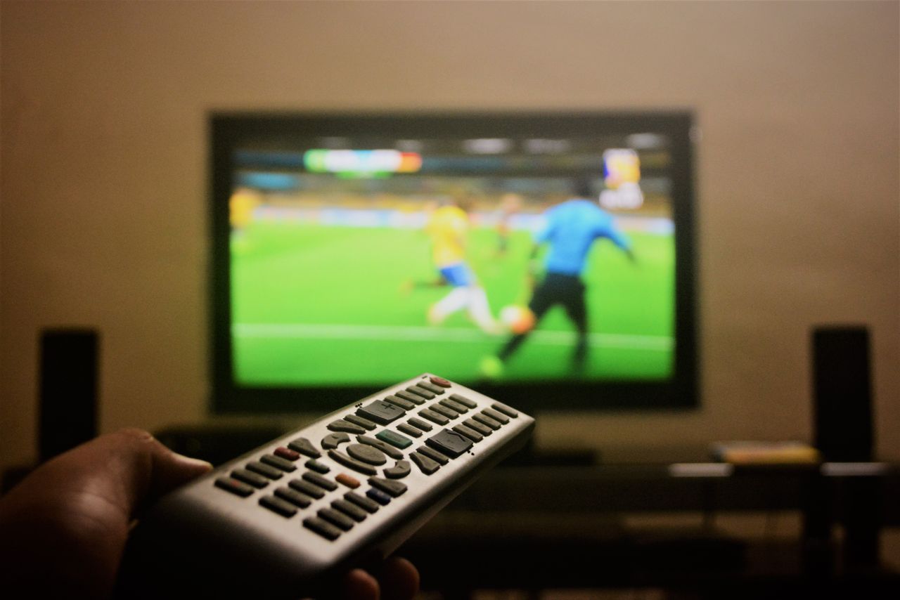 Sports fans in South Africa watching IPTV on television