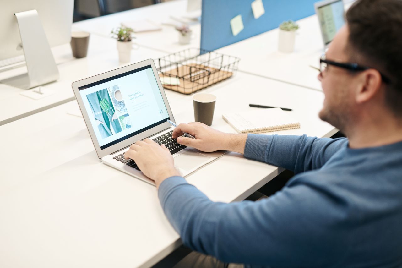 Business professional using document management software